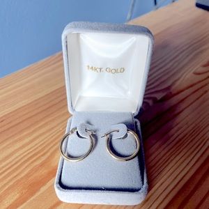 14K yellow gold hoop earrings.